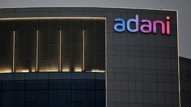 Logo of Adani Group seen on the facade of one of its buildings on the outskirts of Ahmedabad, India