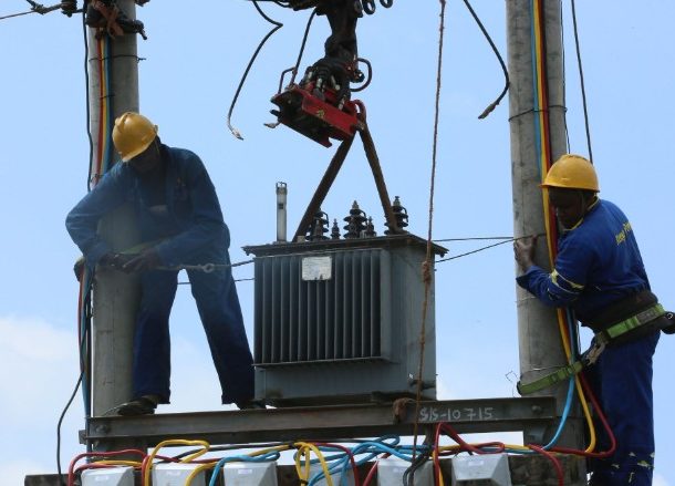 Image of KPLC technicians fixing a transformer